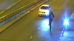 Driver jailed for murdering biker who did wheelie