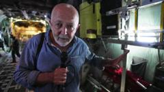 Watch: BBC’s Jeremy Bowen goes onboard a plane dropping aid into Gaza