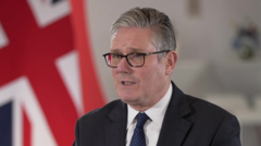 China lifts sanctions on MPs and peers, as Starmer says he hopes Xi will visit UK