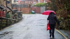 Weather warnings issued for heavy rain and strong winds in parts of UK